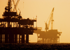 offshore oil rig at sunset