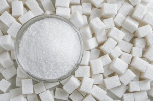 Processing-Dependent Amorphous Regions in Sugar
